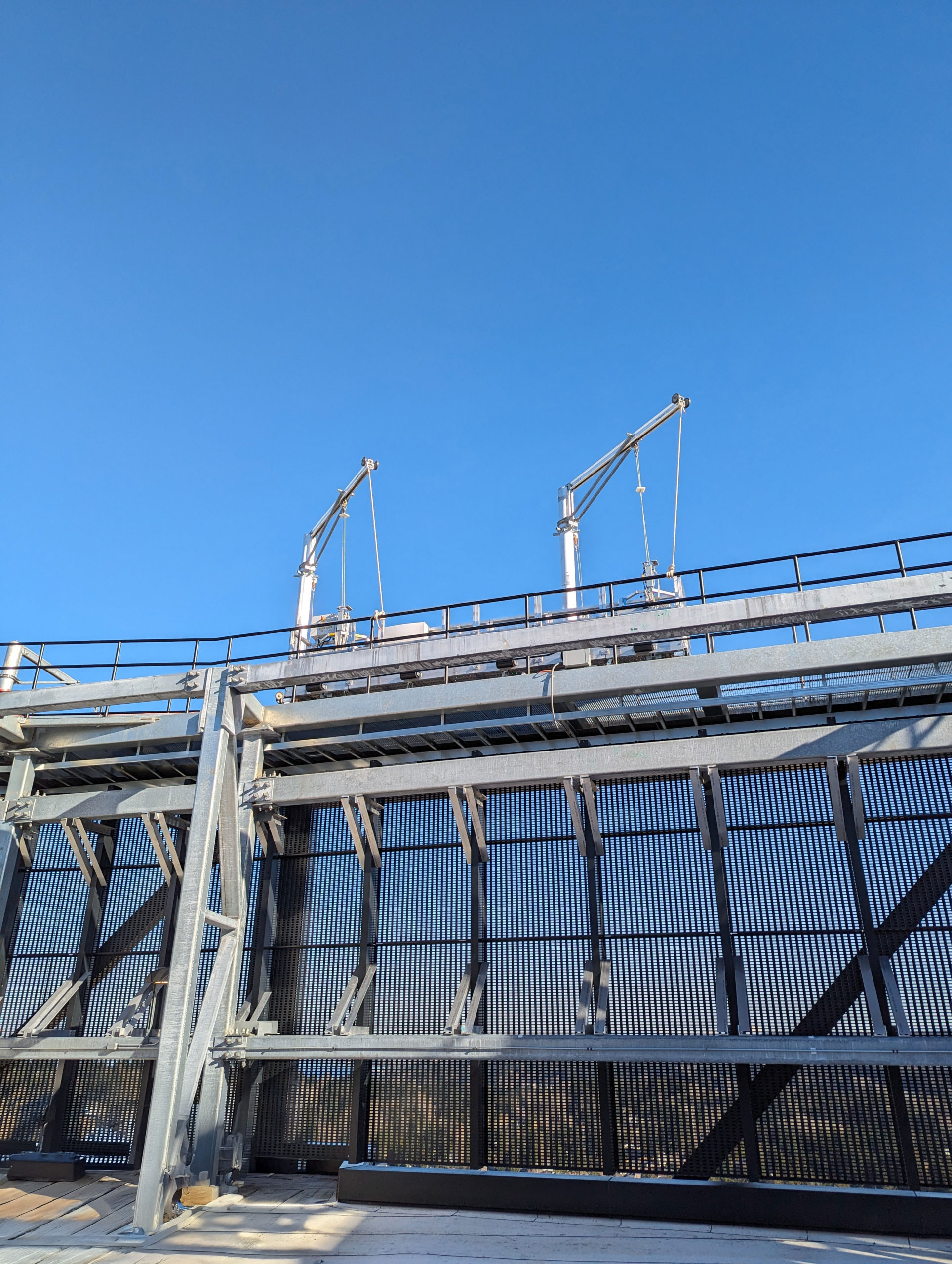Representative rooftop facade access equipment on a commercial building